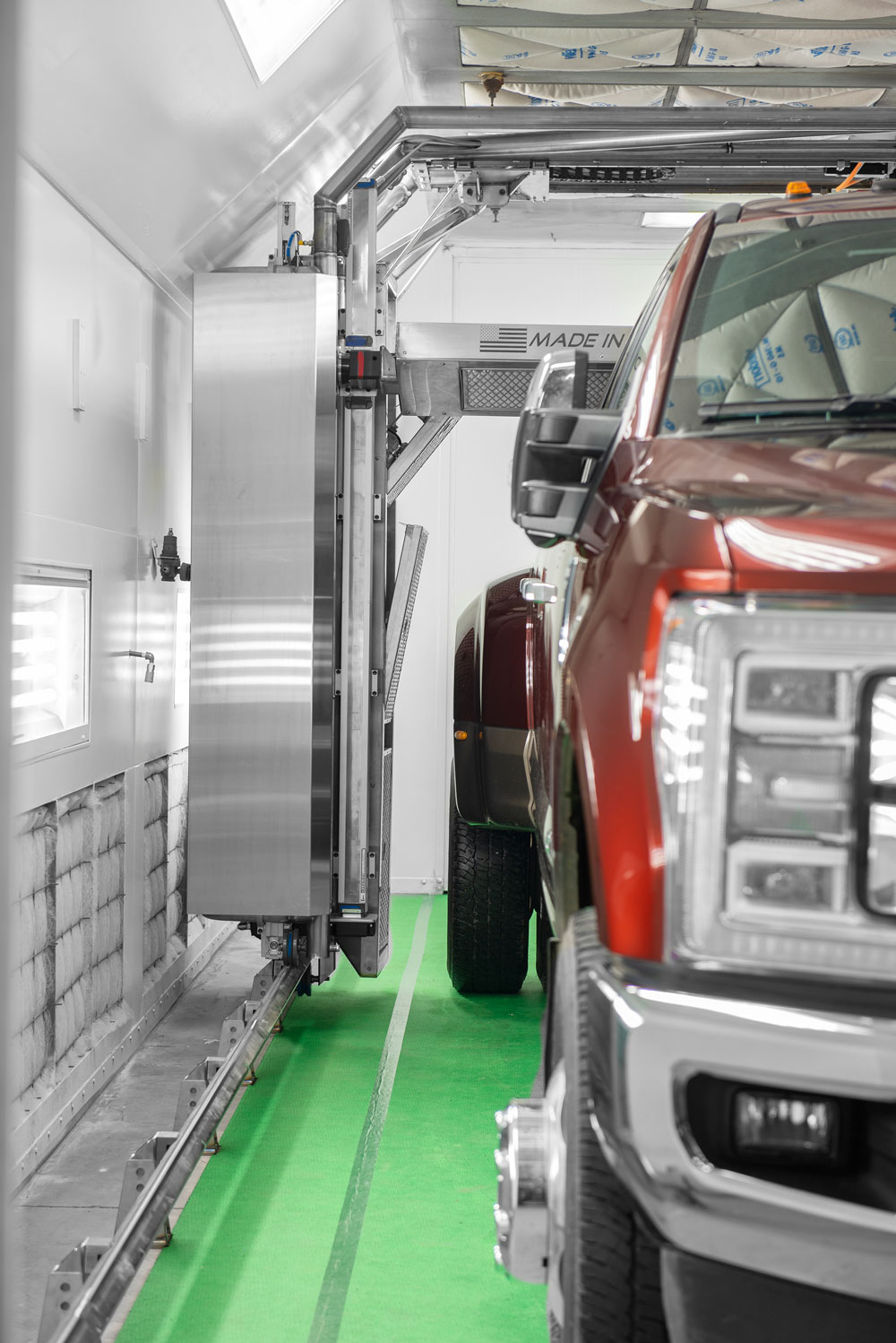 red truck in paint booth